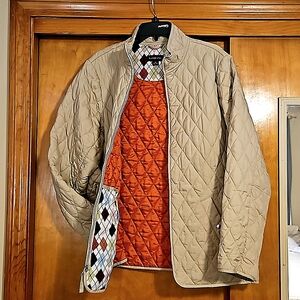 Lands End, tan quilted, zip up jacket.  It is very light,which is why I love it.